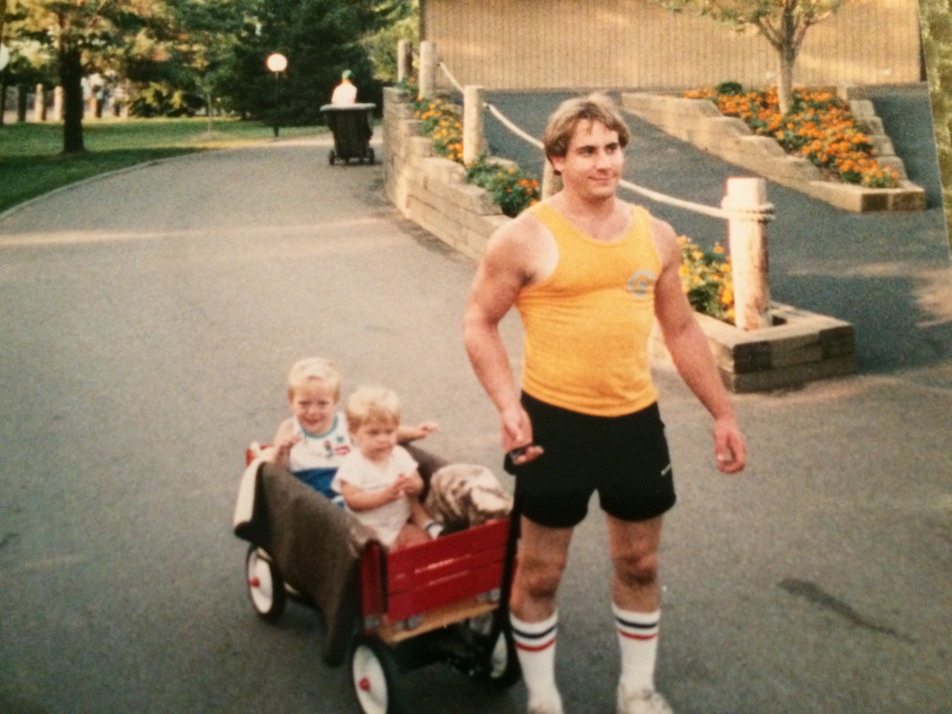 Dad with David and sister in wagon.jpg